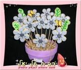 עציץ עוגיות פרחים בסגול